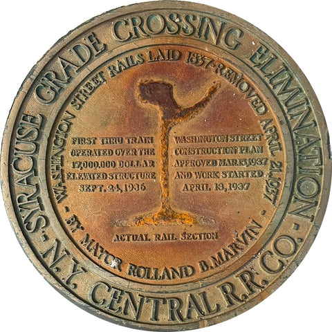 PROJECT EAST - Syracuse, NY - Sewer Cover Doormat